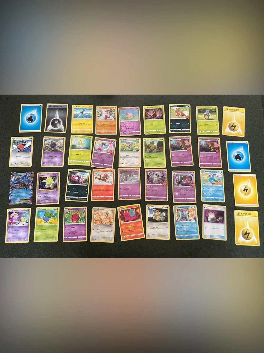 Pokemon Trading Cards Assortment - Purple, Yellow, Green, Blue- Lot of 67 cards